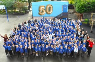 pupils and 50th banner